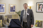 MP with plaque at official opening of care home at The Bridge